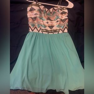 teal strapless w/sequenced topped by levee at the pink Lily boutique size small